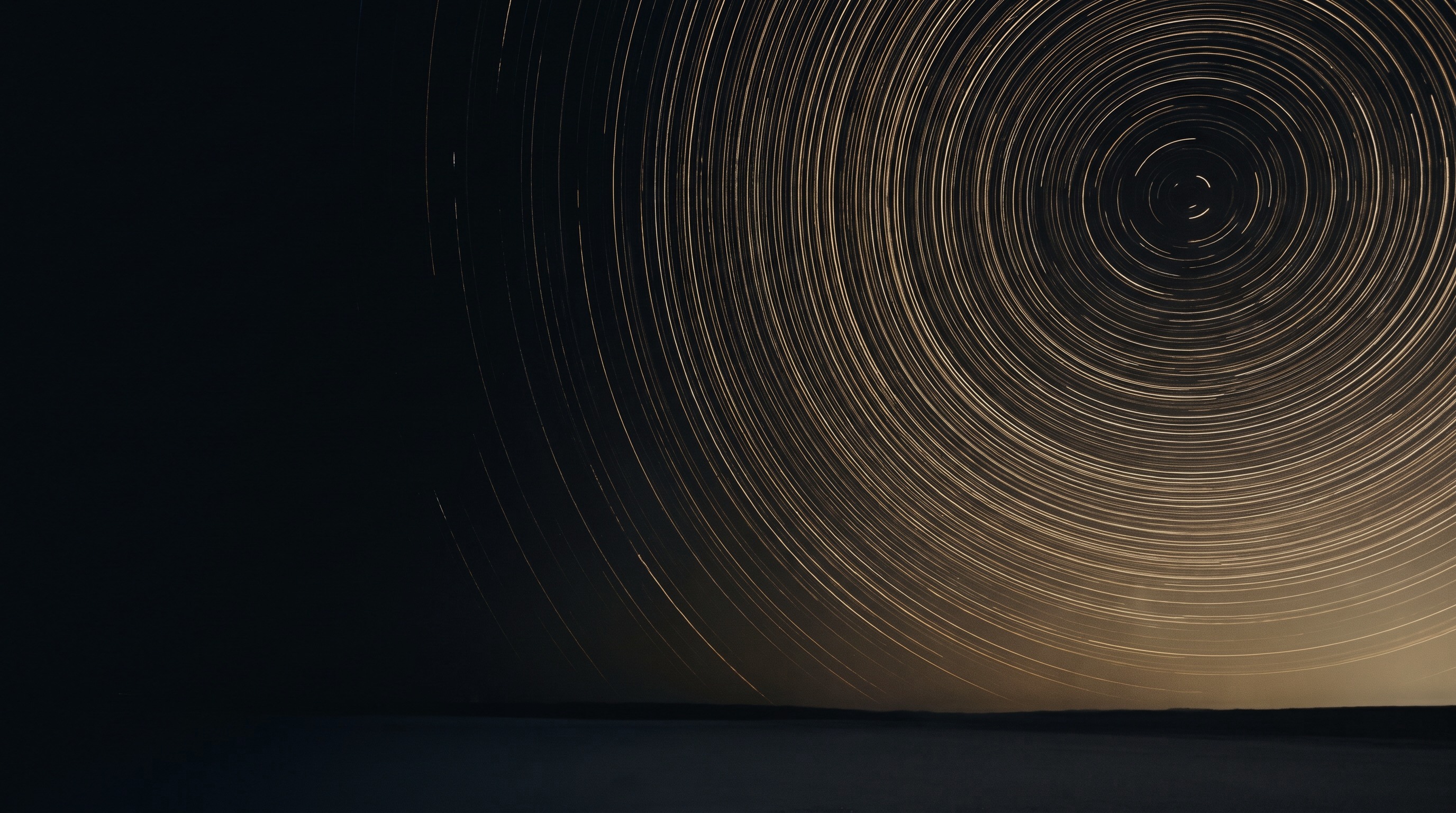 Long-exposure star trails turning around the celestial pole